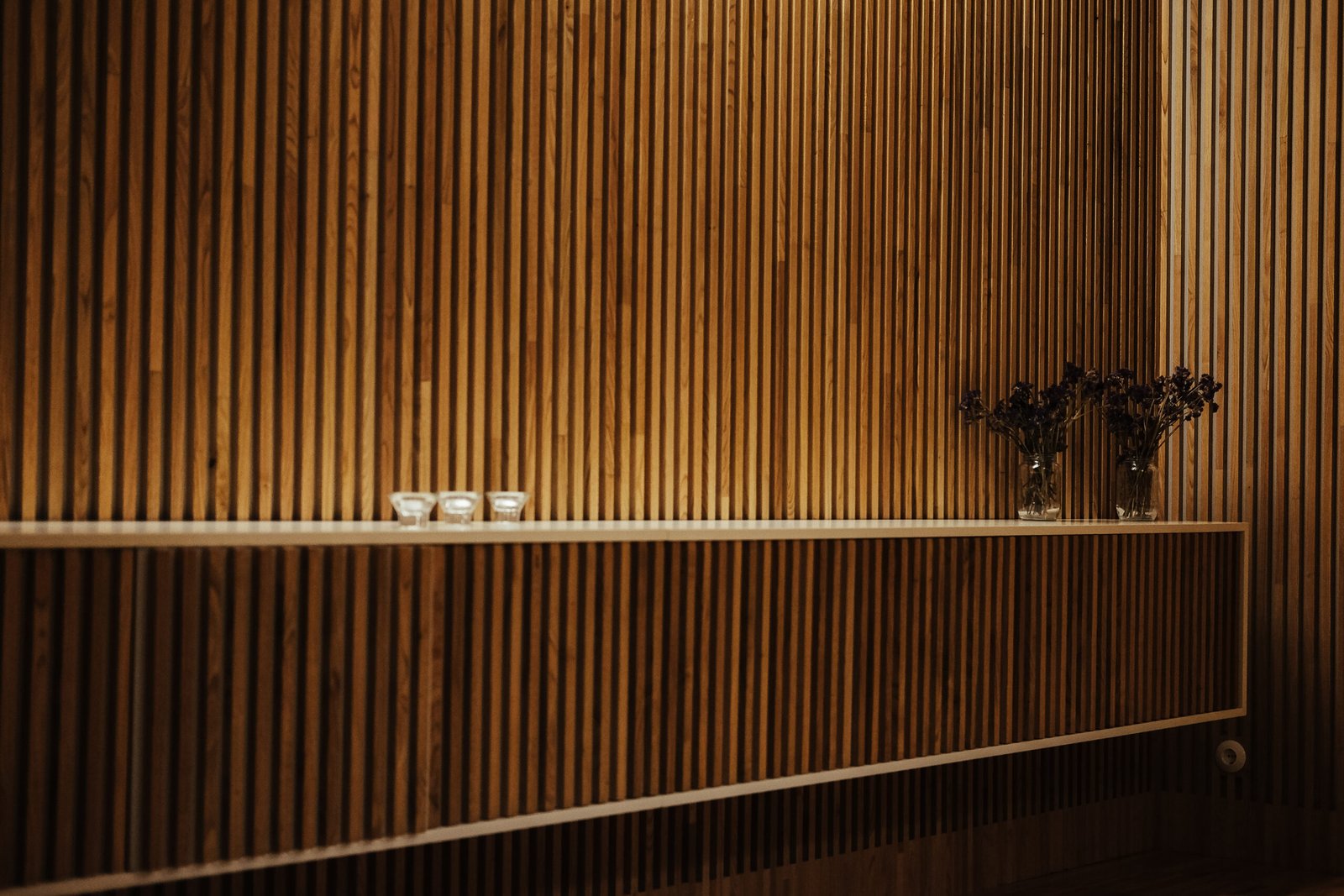 A wall made with slatted wood